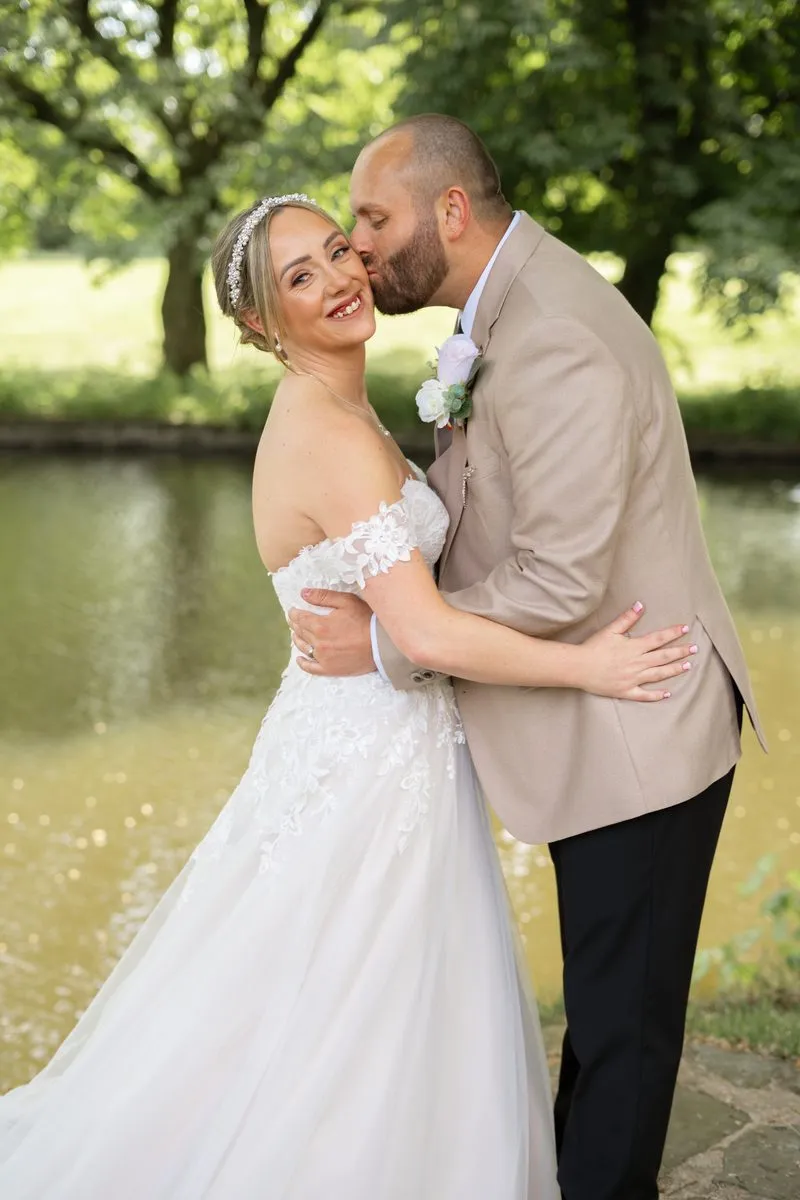 The couple by the water