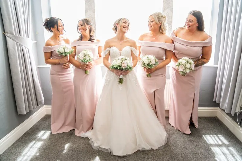 The bride with her bridesmaids before the ceremony
