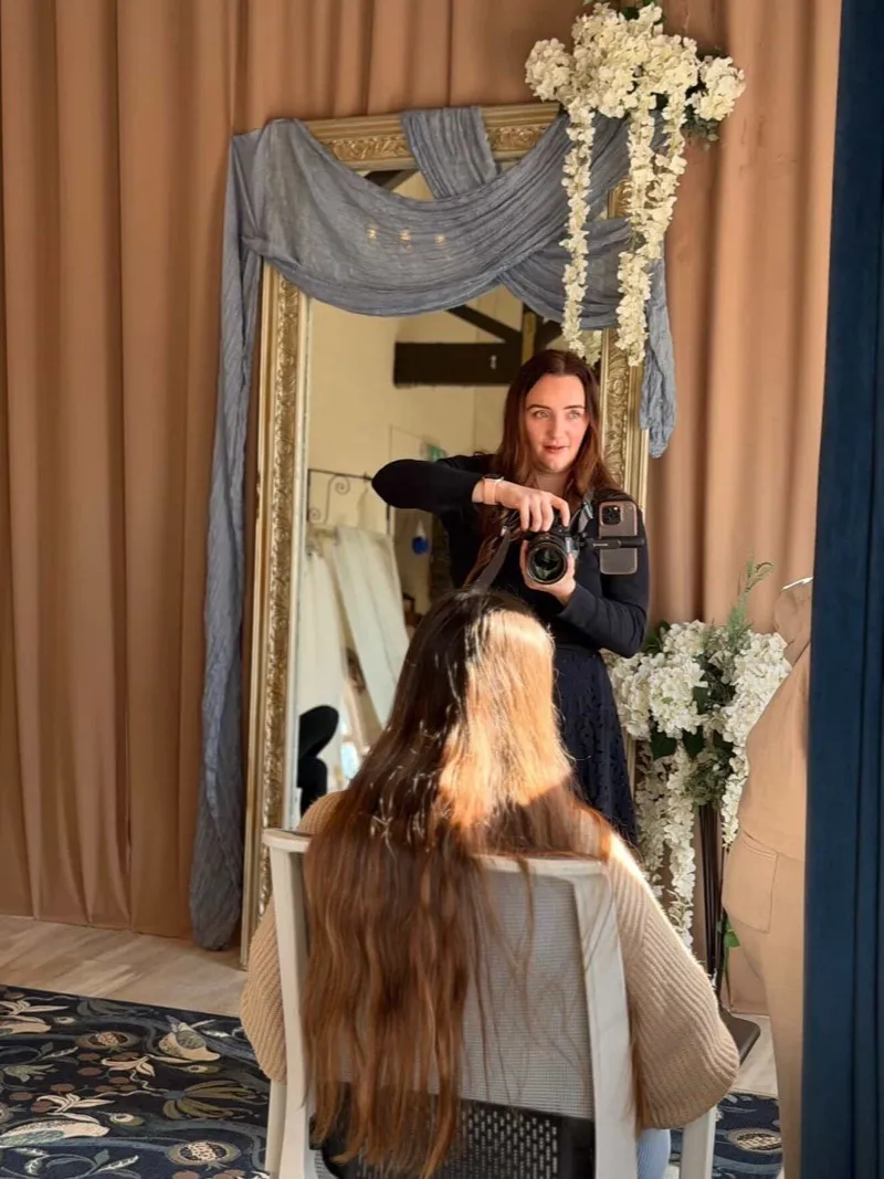 Rotherham wedding photographer Gemma Quinn photographing a bride, reflected in a mirror